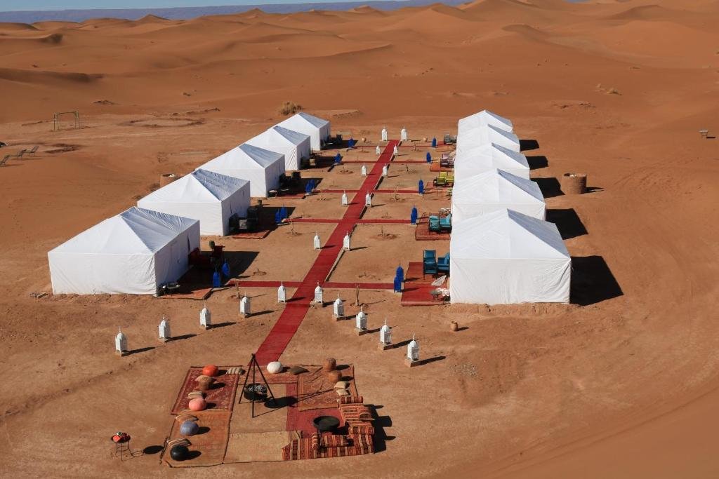Camel ride at sunset in Merzouga desert