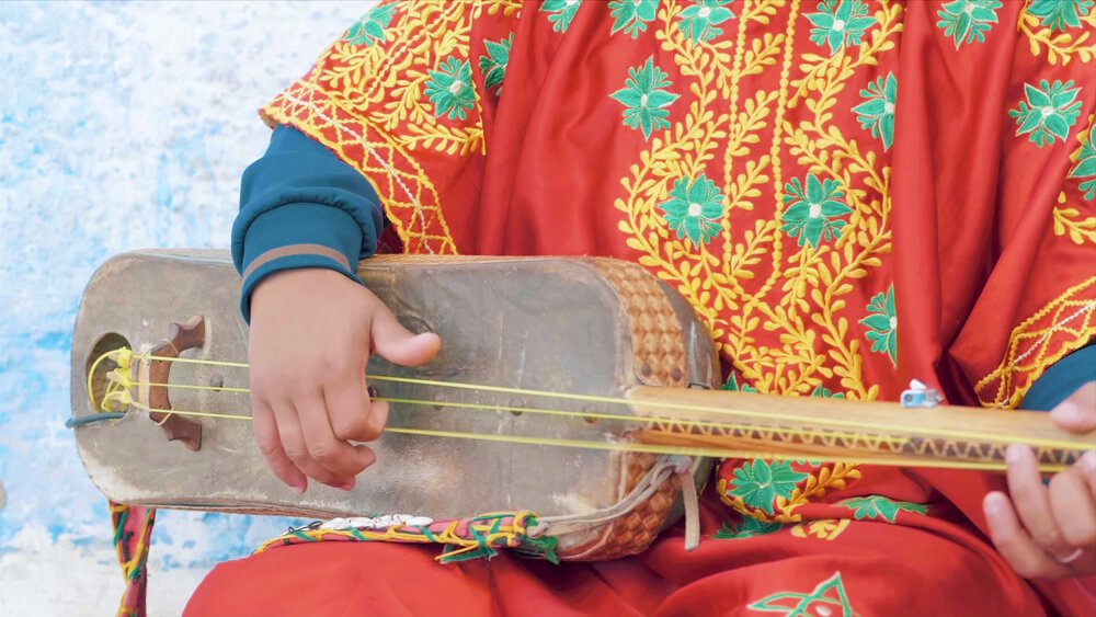 Gnawa music ceremony with traditional instruments