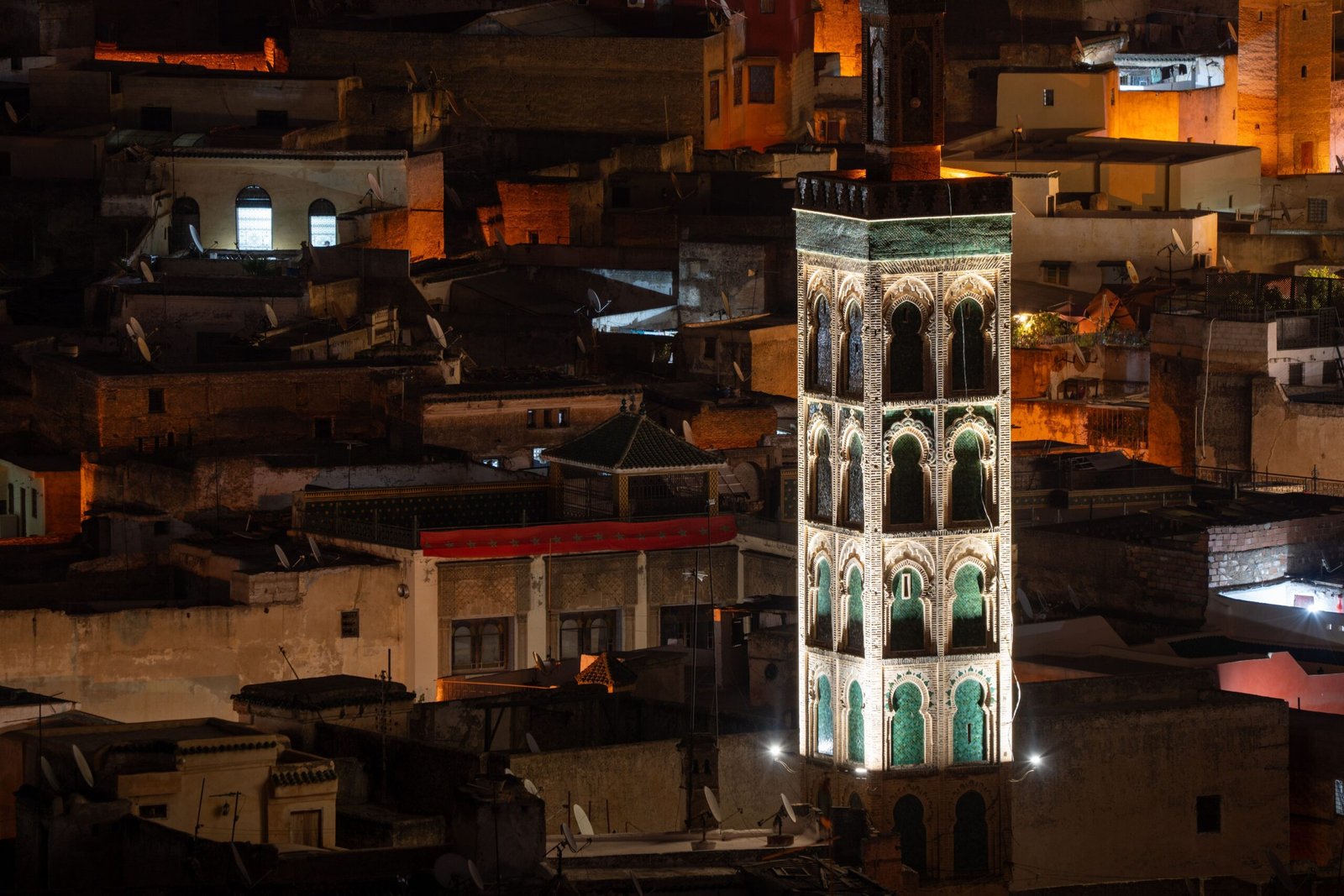 Illuminated tower in Fes at night