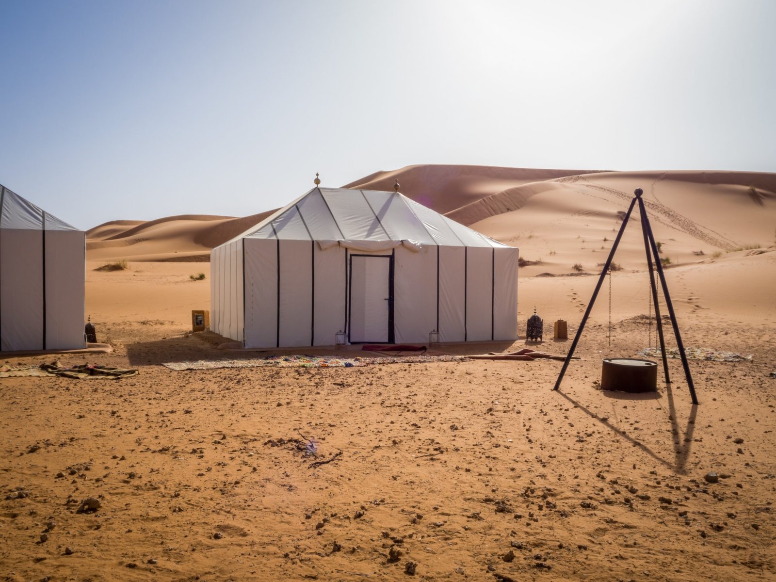White Berber tent in Sahara desert landscape
